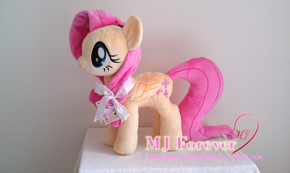 Huge Fluttershy plushie by Wild-Hearts